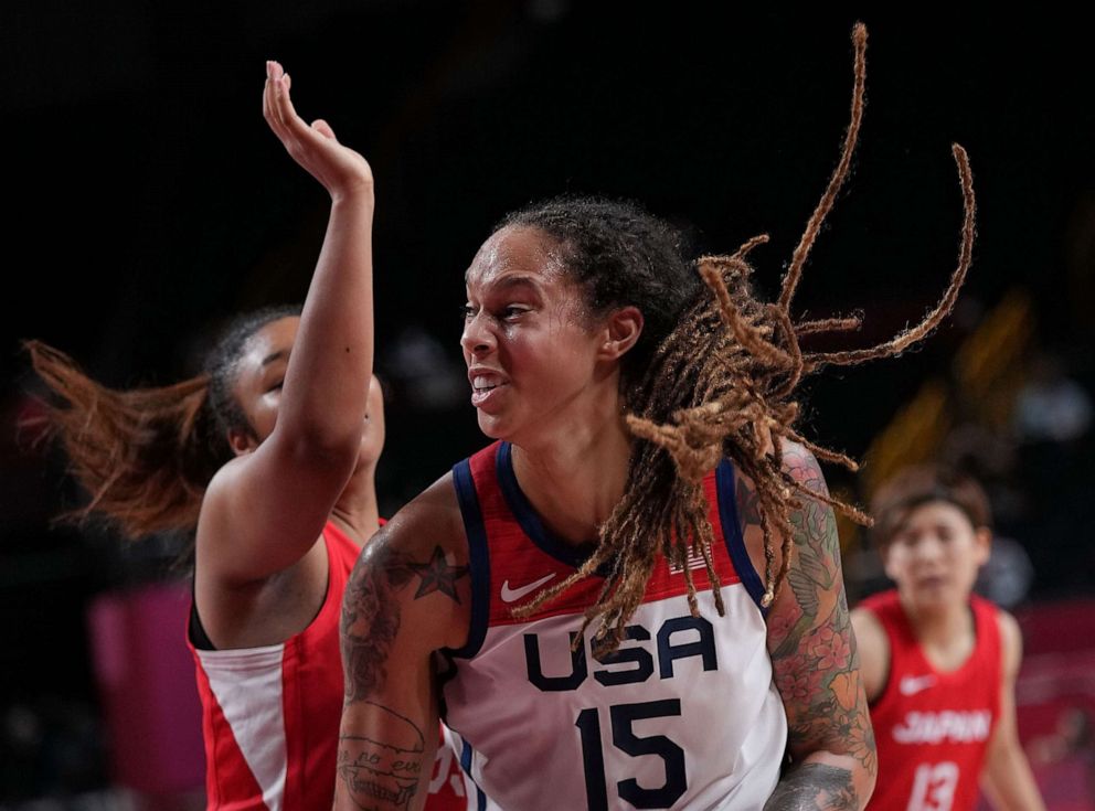 PHOTO: Brittney Griner, center, breaks through during the women's basketball final between the United States and Japan at the Tokyo 2020 Olympic Games in Saitama, Japan, Aug. 8, 2021.