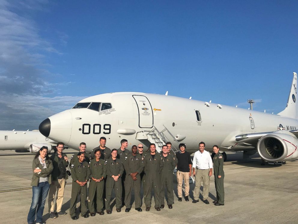 PHOTO:  Reporters pose with members of U.S. Navy Maritime Patrol Squadron Four, in Okinawa, Japan, on Sep. 6, 2018.