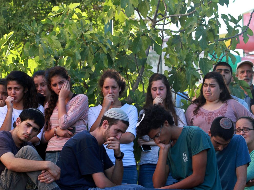 PHOTO: Friends and relatives of Israeli Hallel Yaffa Ariel, a 13-year-old girl who was fatally stabbed by a Palestinian attacker in her home, mourn during her funeral in Kiryat Arba, outside the West Bank city of Hebron on June 30, 2016.
