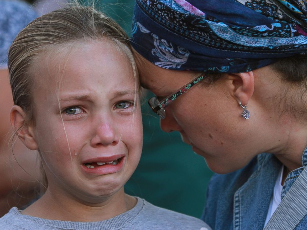 PHOTO: Friends and relatives of Israeli Hallel Yaffa Ariel, a 13-year-old girl who was fatally stabbed by a Palestinian attacker in her home, mourn during her funeral in Kiryat Arba, outside the West Bank city of Hebron on June 30, 2016.
