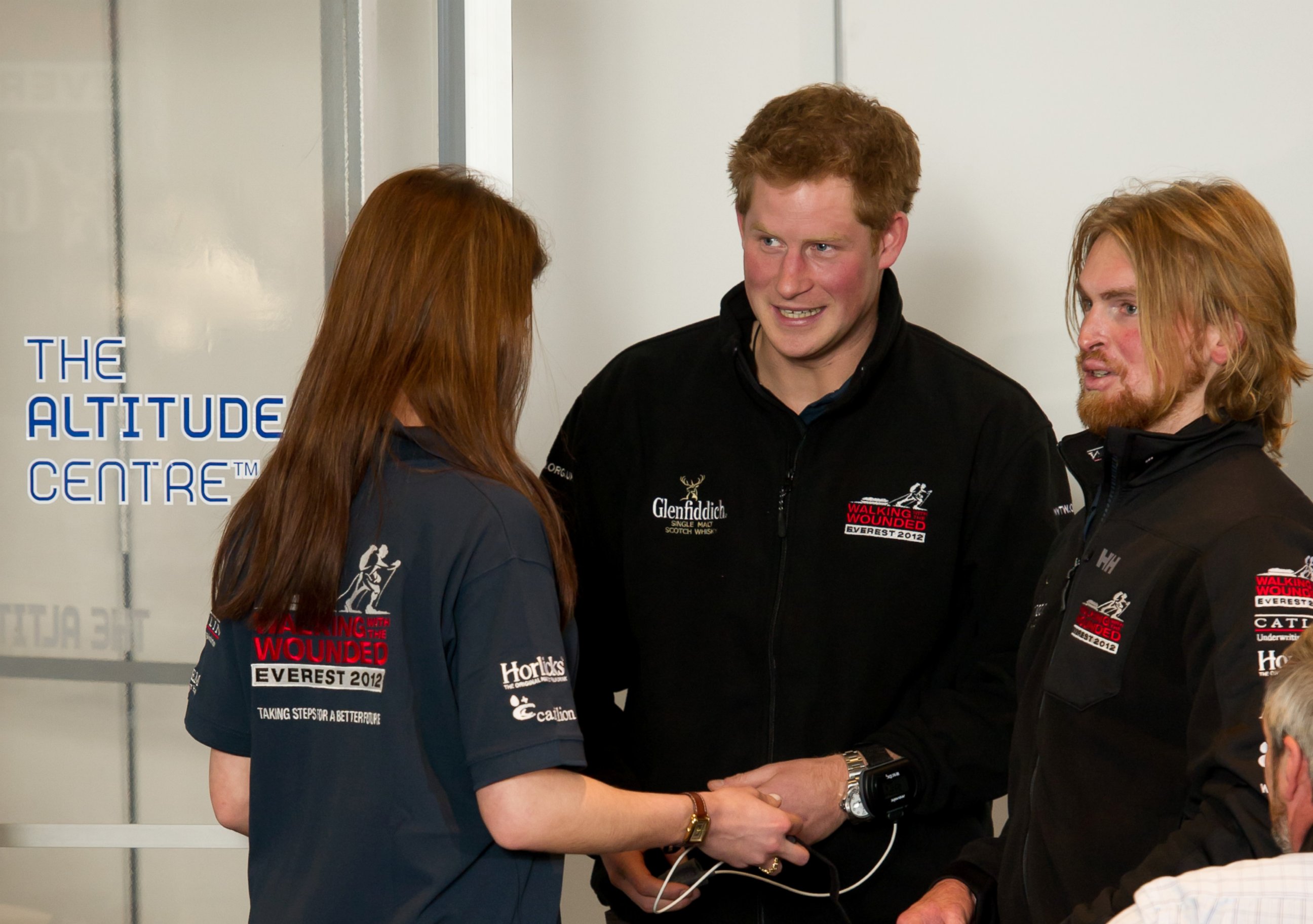 PHOTO: LONDON, ENGLAND - FEBRUARY 10: Prince Harry and Private Karl Hinett of the Staffordshire Regiment exit the altitude chamber during the 'Walking With The Wounded Everest 2012' expedition launch at BAFTA, Feb. 10, 2012, in London. 