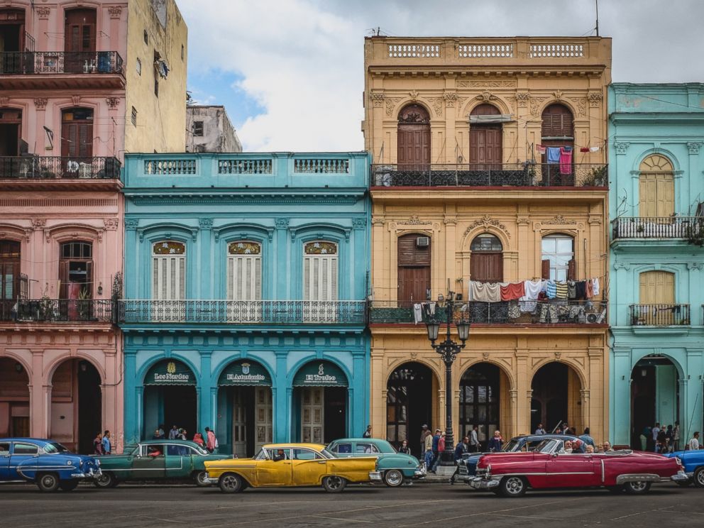 PHOTO: Colonial buildings appear in this undated photo of old Havana, with many colorful old american cars driving along the road.