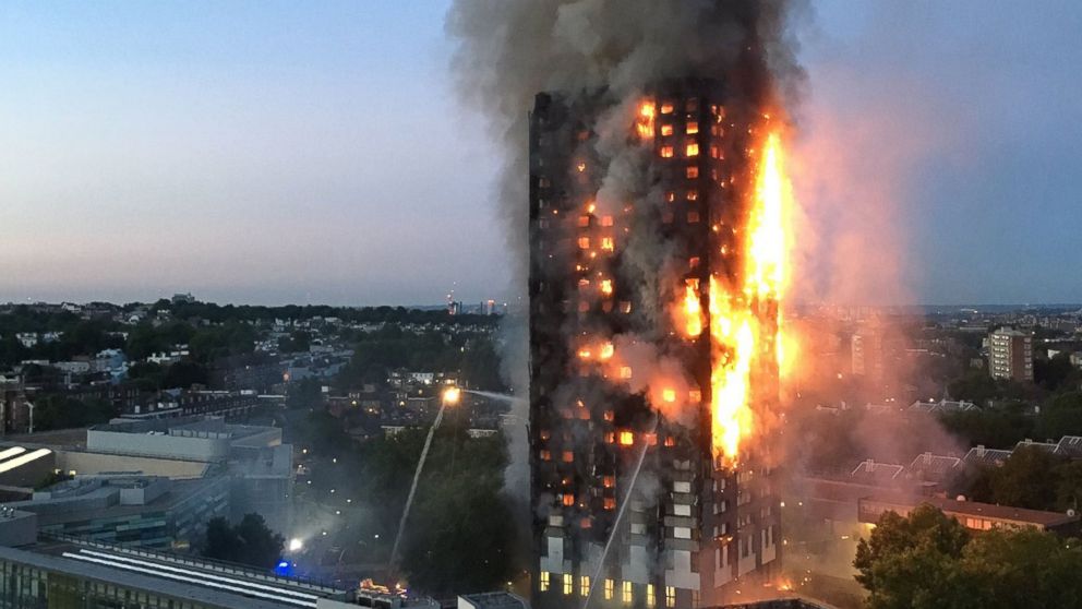 This handout image received by local resident Natalie Oxford early, June 14, 2017, shows flames and smoke coming from a 27-story block of flats after a fire broke out in west London.
