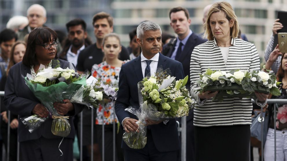 Diane Abbott, MP for Hackney North and Stoke Newington, Mayor of London Sadiq Khan and Home Secretary Amber Rudd take part in a vigil for the victims of the London Bridge terror attacks, in Potters Fields Park, June 5, 2017, in London.