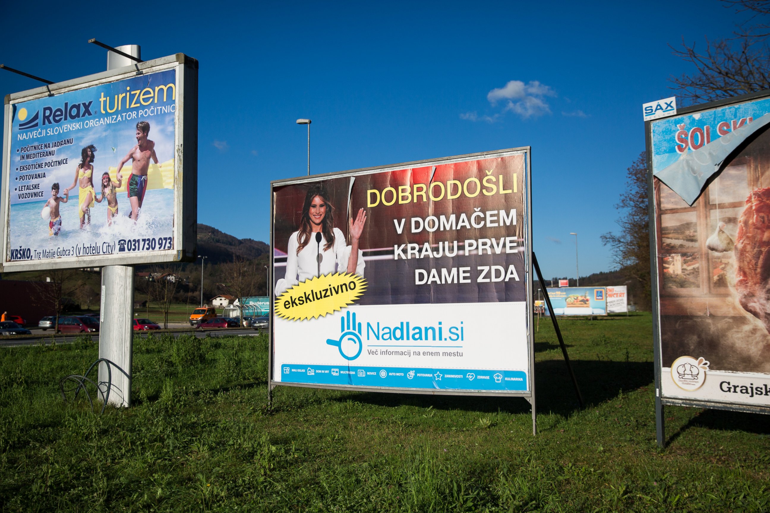 PHOTO: A sign which reads 'Welcome to the Hometown of the First Lady' in Slovenian, is pictured among other billboards on Nov. 29, 2016 in Sevnica, Slovenia.