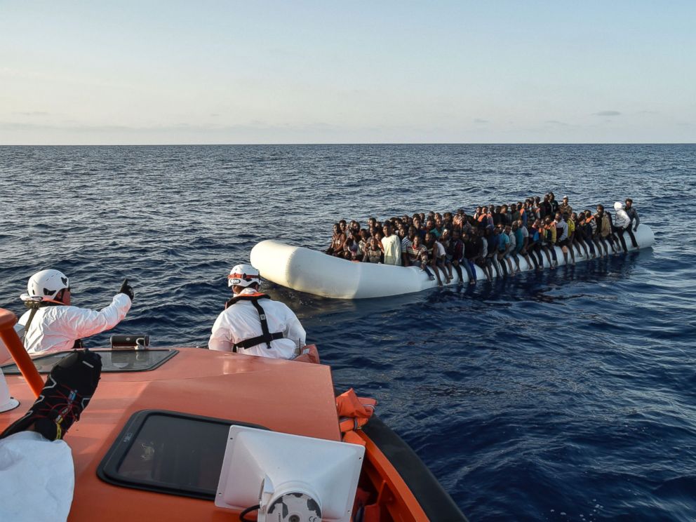 PHOTO: Migrants aboard a rubber boat wait to be rescued by the Maltese NGO Moas and the Italian Red Cross off the Libyan coast in the Mediterranean Sea, Nov. 3, 2016.