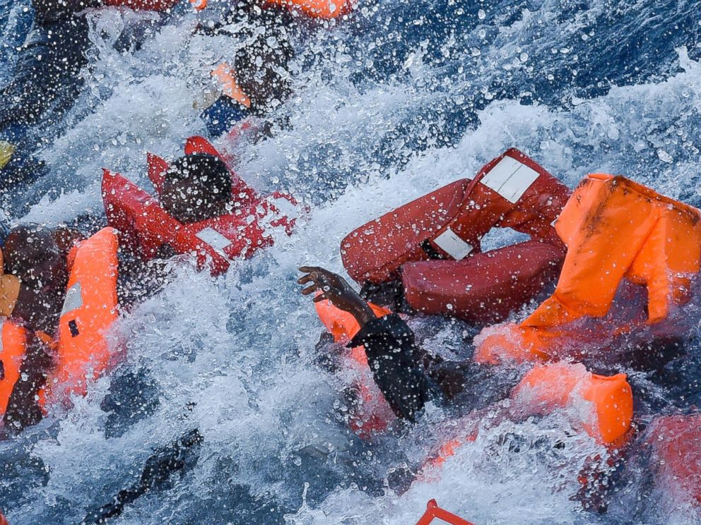 PHOTO: Migrants panic as they fall in the water during a rescue operation off the Libyan coast in the Mediterranean Sea, Nov. 3, 2016.