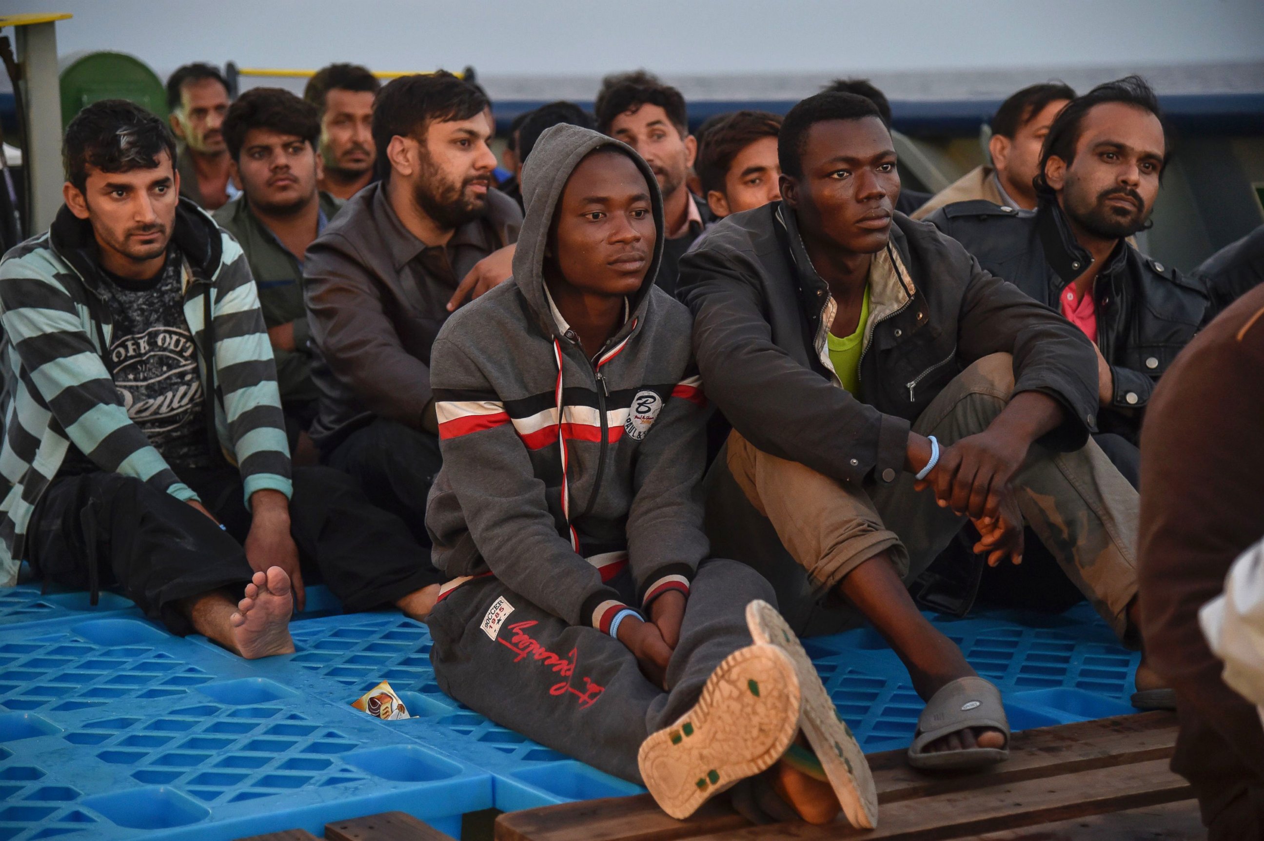 PHOTO: Refugees sit aboard the ship Topaz Responder after being rescued off the Libyan coast in the  Mediterranean Sea, Nov. 3, 2016. 