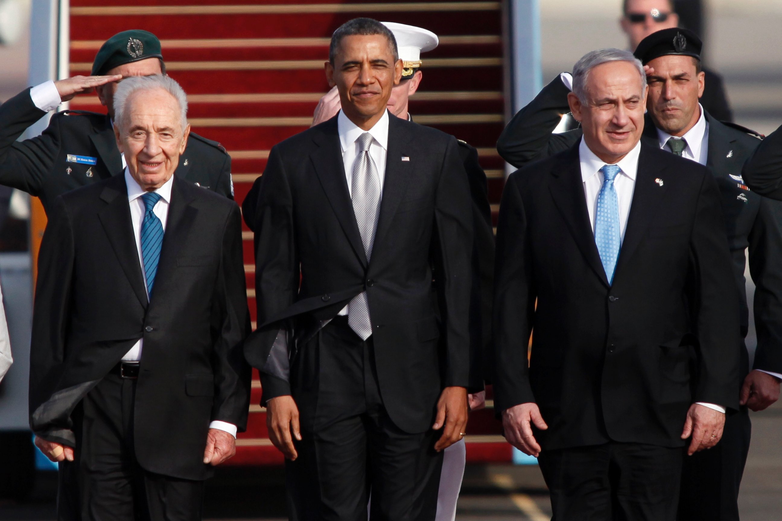 PHOTO: Israeli President Shimon Peres, U.S. President Barack Obama and Israeli Prime Minister Benjamin Netanyahu stand together prior to Obama departing from Ben Gurion International Airport, March 22, 2013, in Lod, Israel.