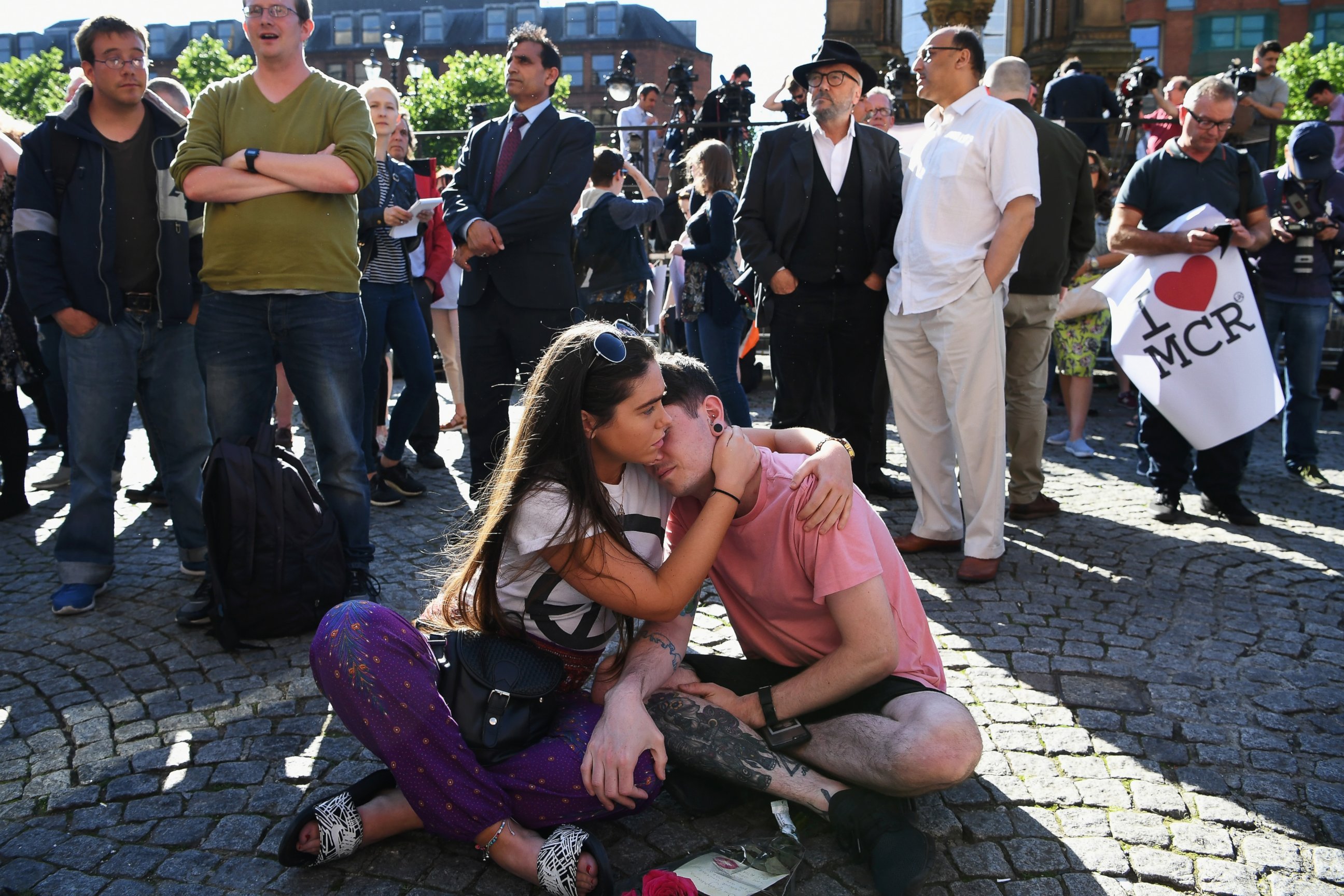 PHOTO: Members of the public gather to attend a vigil, to honor the victims of Monday evening's terror attack, at Albert Square on May 23, 2017 in Manchester, England.