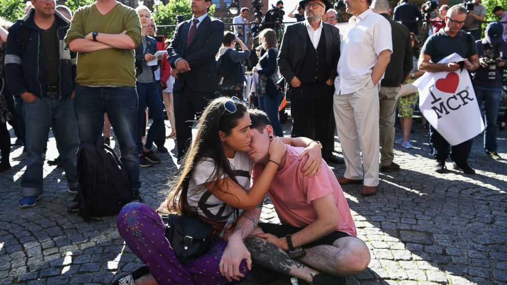 PHOTO: Members of the public gather to attend a vigil, to honor the victims of Monday evening's terror attack, at Albert Square on May 23, 2017 in Manchester, England.