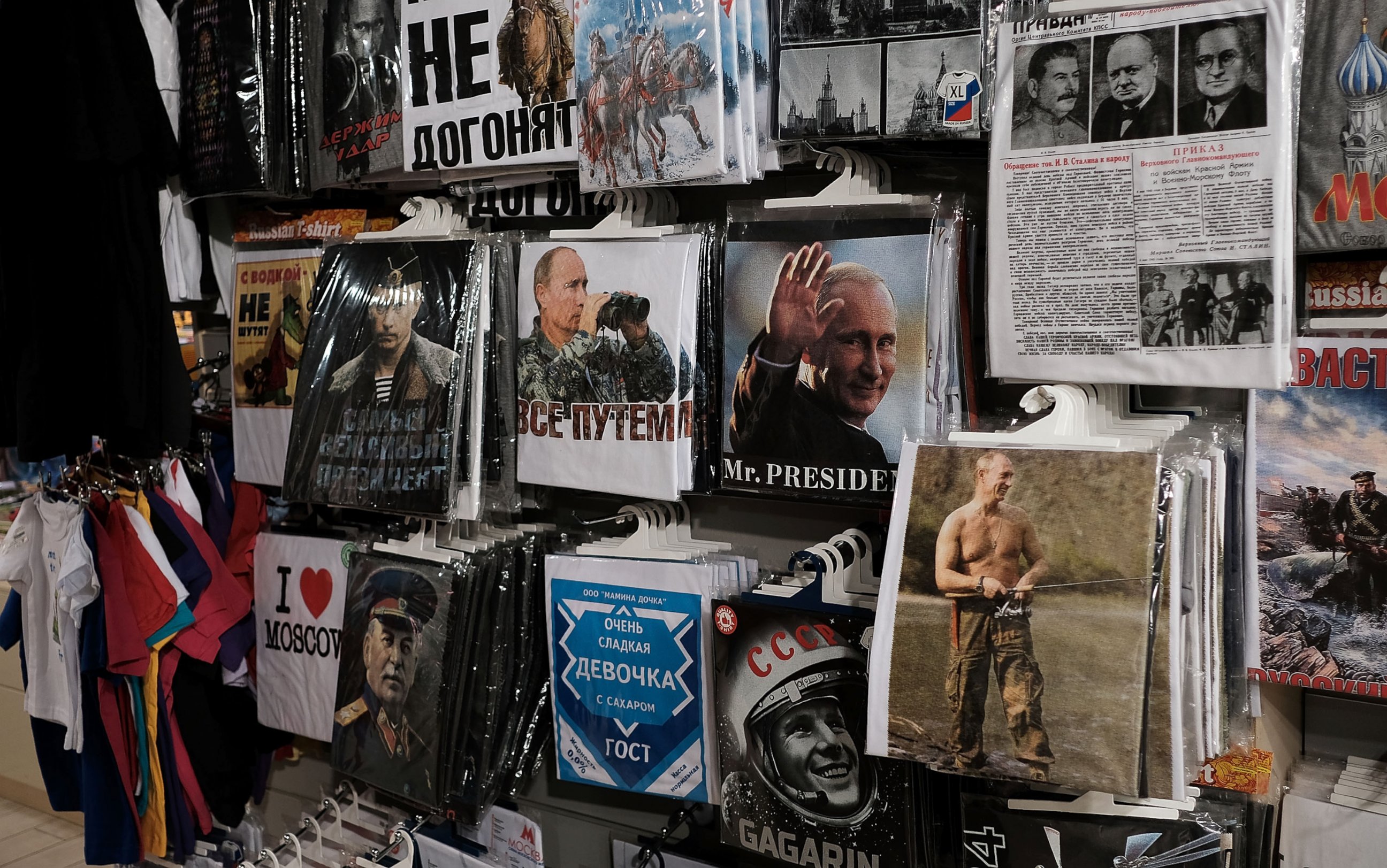 PHOTO: T-shirts with pictures of Russian President Vladimir Putin are displayed for sale at a store in Moscow, March 5, 2017.