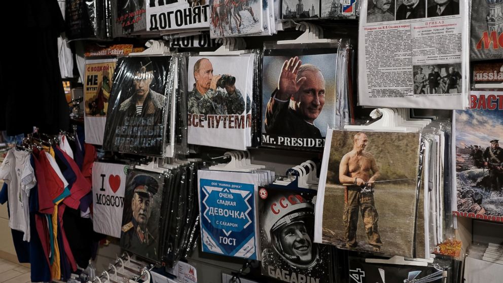 PHOTO: T-shirts with pictures of Russian President Vladimir Putin are displayed for sale at a store in Moscow, March 5, 2017.