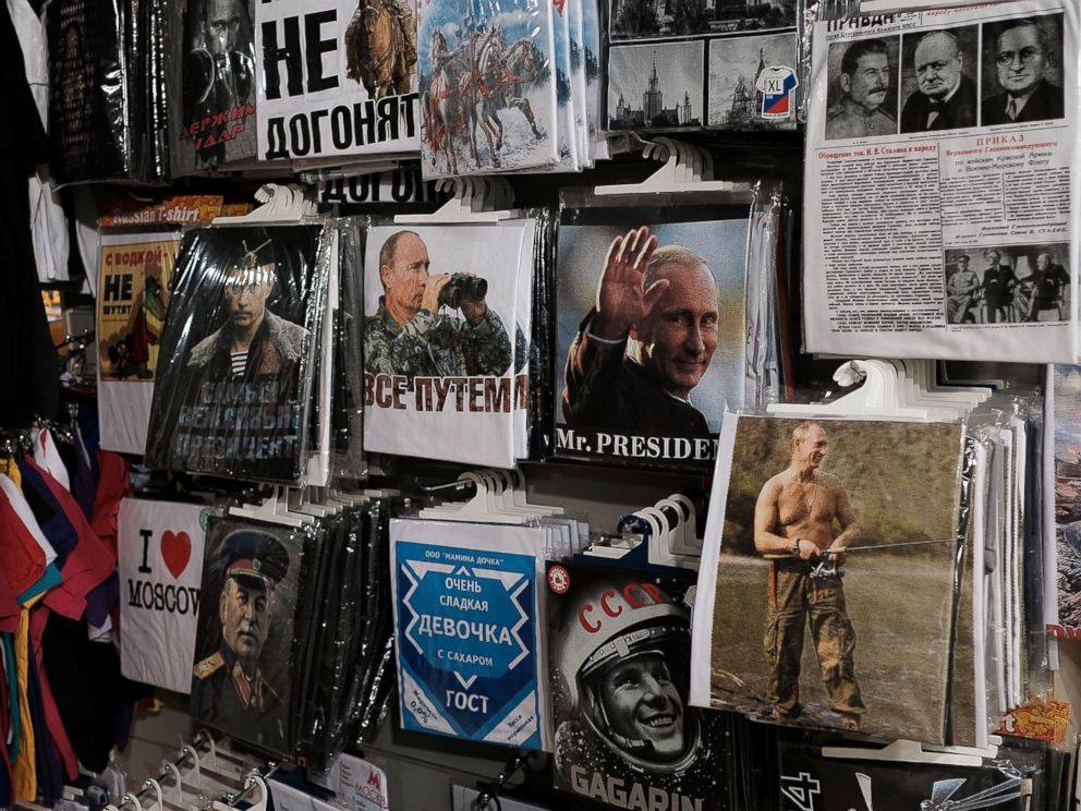 PHOTO: T-shirts with pictures of Russian President Vladimir Putin are displayed for sale at a store in Moscow, March 5, 2017.