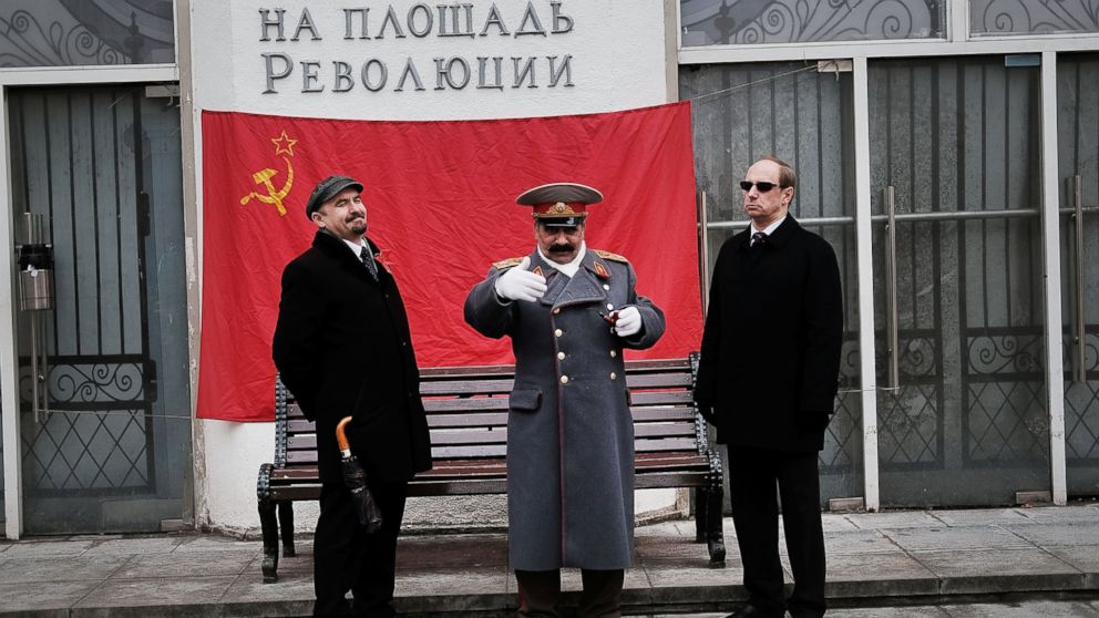 PHOTO: Performers dressed as Vladimir Lenin and Joseph Stalin stand in central Moscow on March 3, 2017.