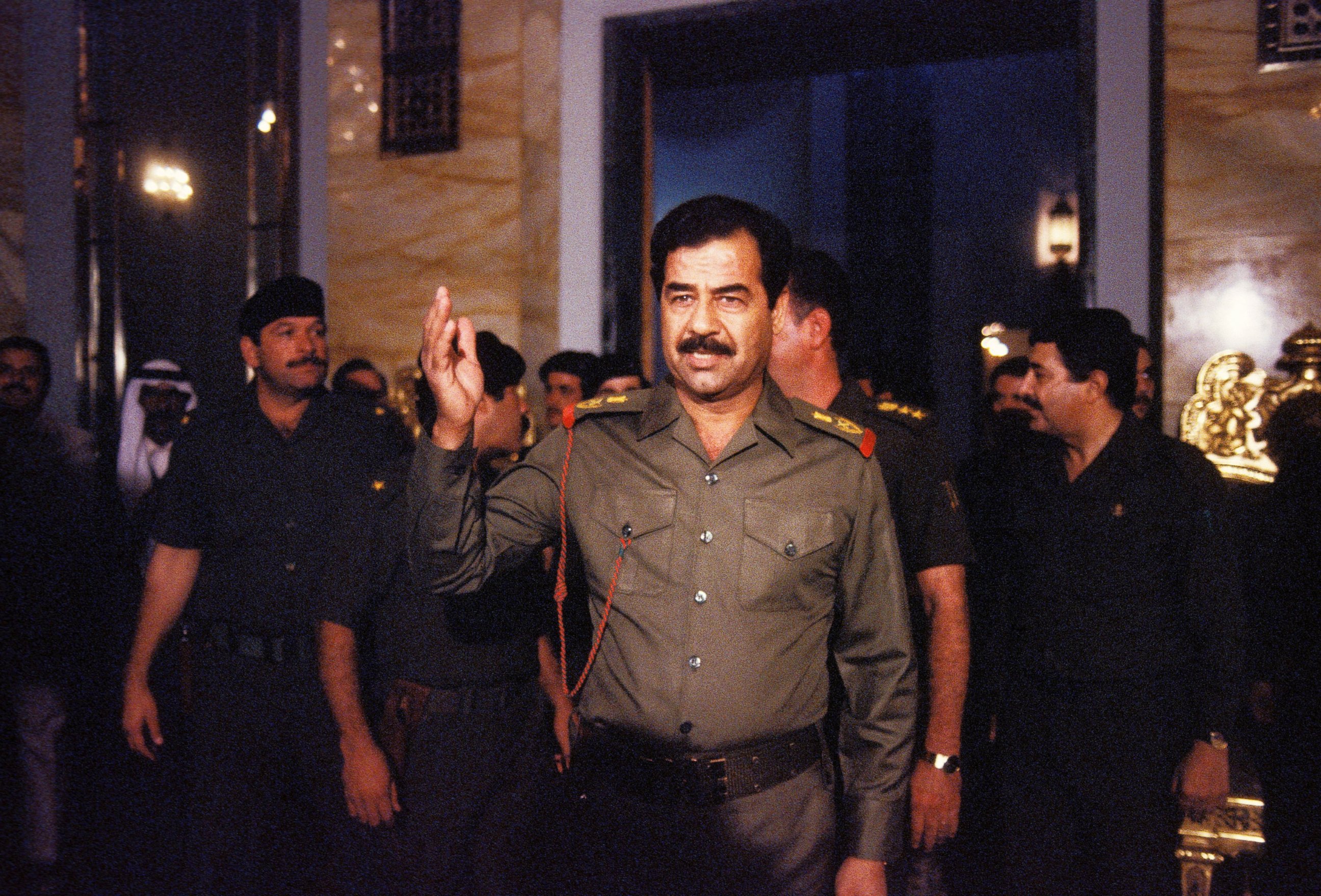 PHOTO: Saddam Hussein welcomes people In Baghdad, Oct. 17, 1983.