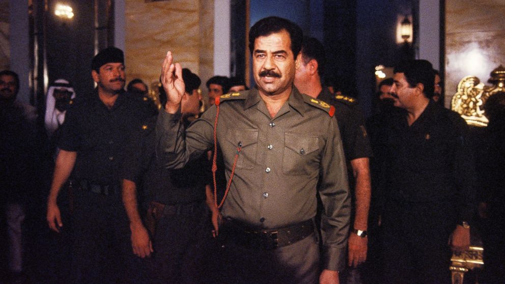 PHOTO: Saddam Hussein welcomes people In Baghdad, Oct. 17, 1983.