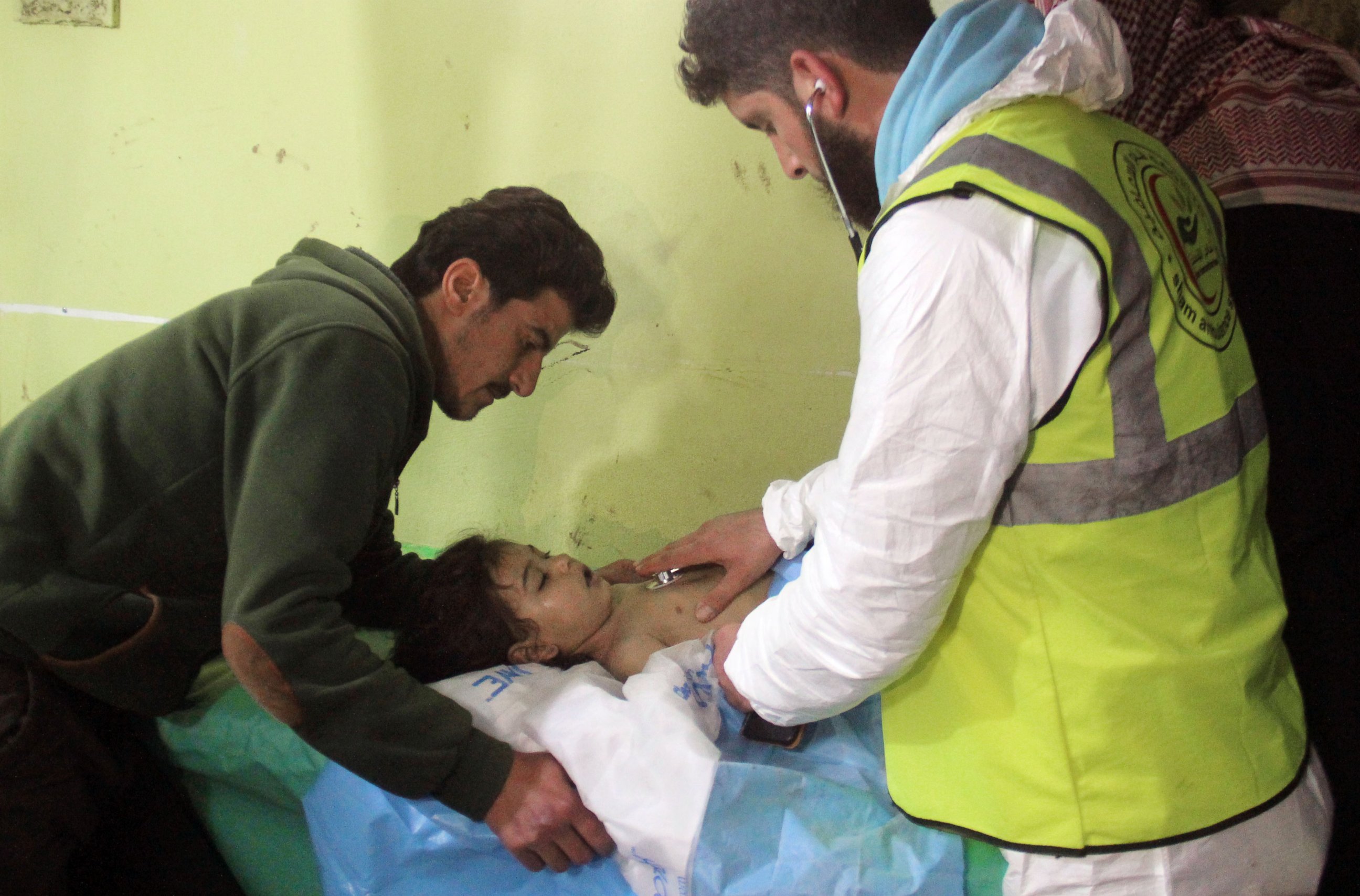 PHOTO: An unconscious Syrian child receives treatment at a hospital in Khan Sheikhun, a rebel-held town in the northwestern Syrian Idlib province, following a suspected toxic gas attack on April 4, 2017.
