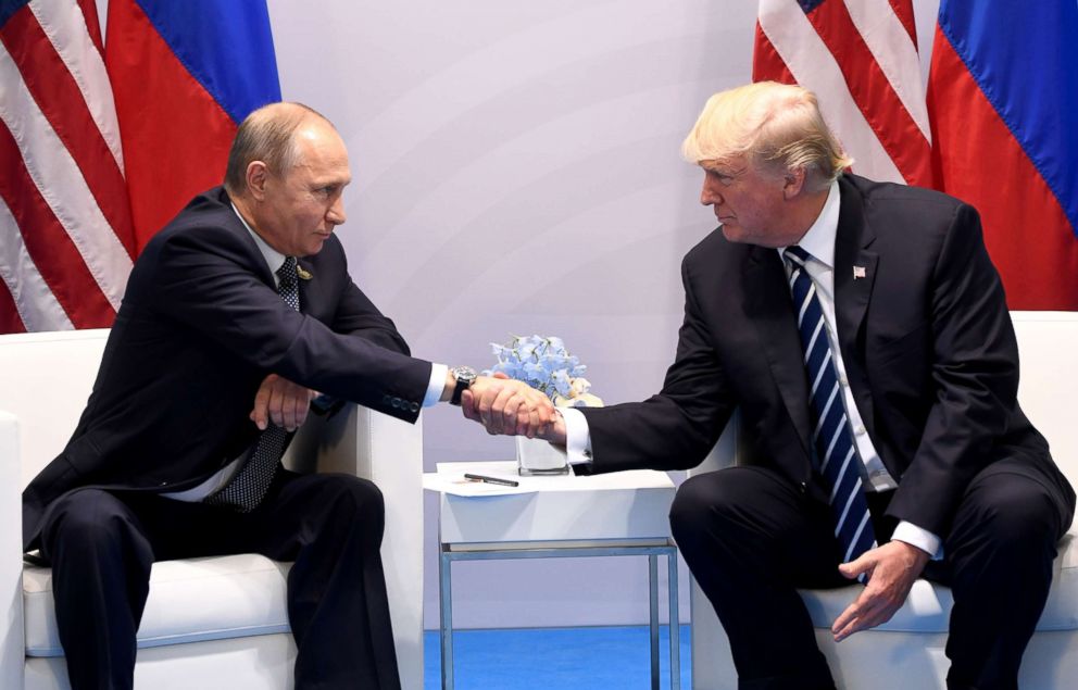 PHOTO: President Donald Trump and Russia's President Vladimir Putin shake hands during a meeting on the sidelines of the G20 Summit in Hamburg, Germany, July 7, 2017.