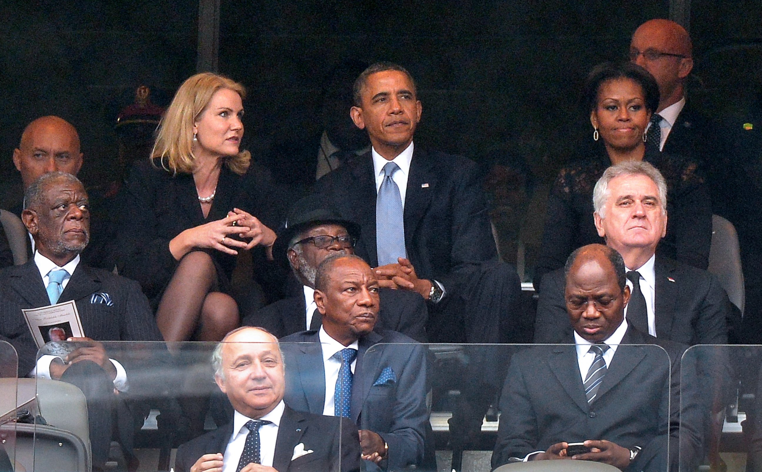 PHOTO: Danish Prime Minister Helle Thorning-Schmidt, US President Barack Obama and First Lady Michelle Obama attend the memorial service for Nelson Mandela at Soccer City Stadium in Johannesburg, Dec. 10, 2013.