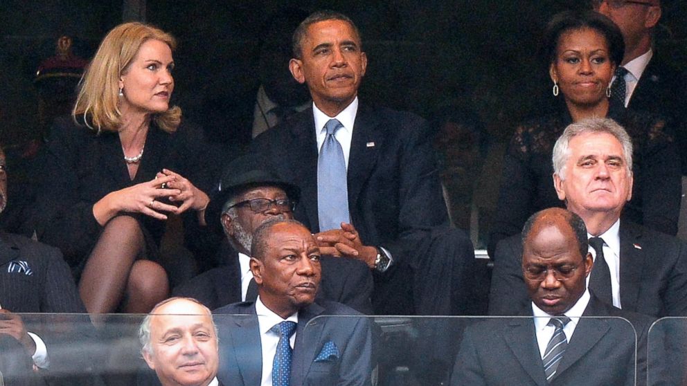 PHOTO: Danish Prime Minister Helle Thorning-Schmidt, US President Barack Obama and First Lady Michelle Obama attend the memorial service for Nelson Mandela at Soccer City Stadium in Johannesburg, Dec. 10, 2013.