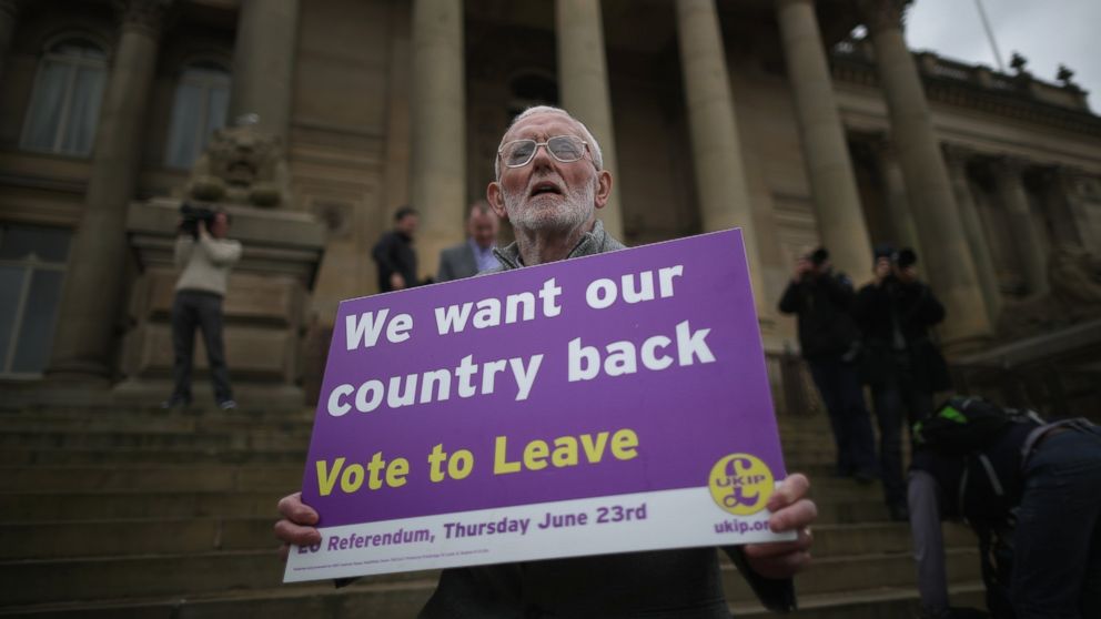 A Vote to Leave campaigner holds a placard as Leader of the United Kingdom Independence Party, Nigel Farage campaigns for votes to leave the European Union in the referendum on May 25, 2016 in Bolton, England. 