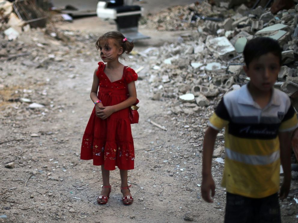 Dramatic Photos From Syria Show Children Celebrating Eid 