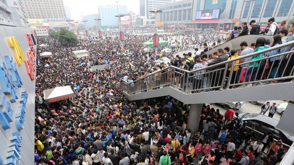 A long-distance bus station is filled with passengers at the start of Golden Week on Oct. 1, 2014 in Zhengzhou, China.