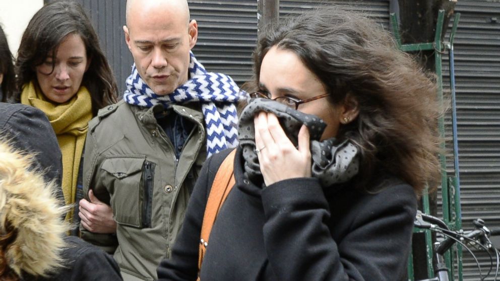 PHOTO: French cartoonist Corinne Rey, far right, whose pen name is Coco, arrives to attend a meeting gathering editorial staff of French satirical weekly newspaper Charlie Hebdo and Liberation in Paris, Jan. 9, 2015.
