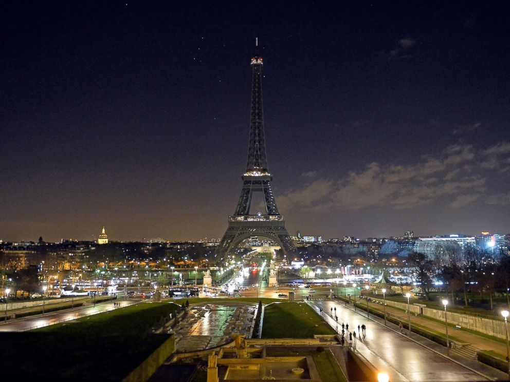 PHOTO: As a tribute for the victims of yesterdays terrorist attack, the lights of the Eiffel Tower were turned off for five minutes at 8pm local time, Jan. 8, 2015 in Paris, France.