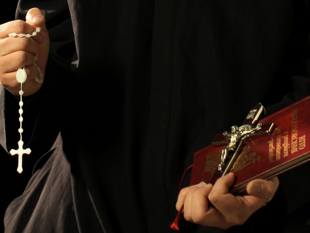 PHOTO: Don Aldo Buonaiuto holds the necessary objects for his exorcisms on Jan. 12, 2012 in Rome, Italy.