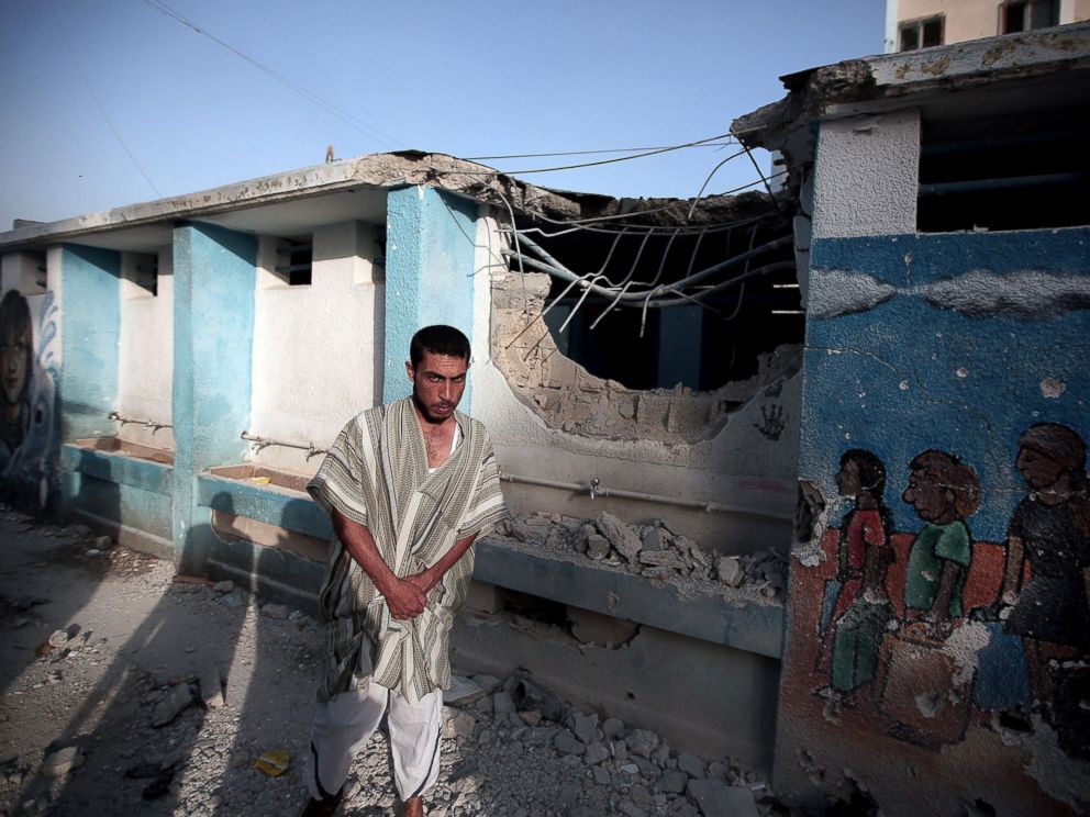 PHOTO: A Palestinian man is seen in Abu Hussein School which was sheltering displaced Palestinians when it was hit by a Israeli tank shell attack, killing at least 17 people according to the Associated Press on July 30, 2014.