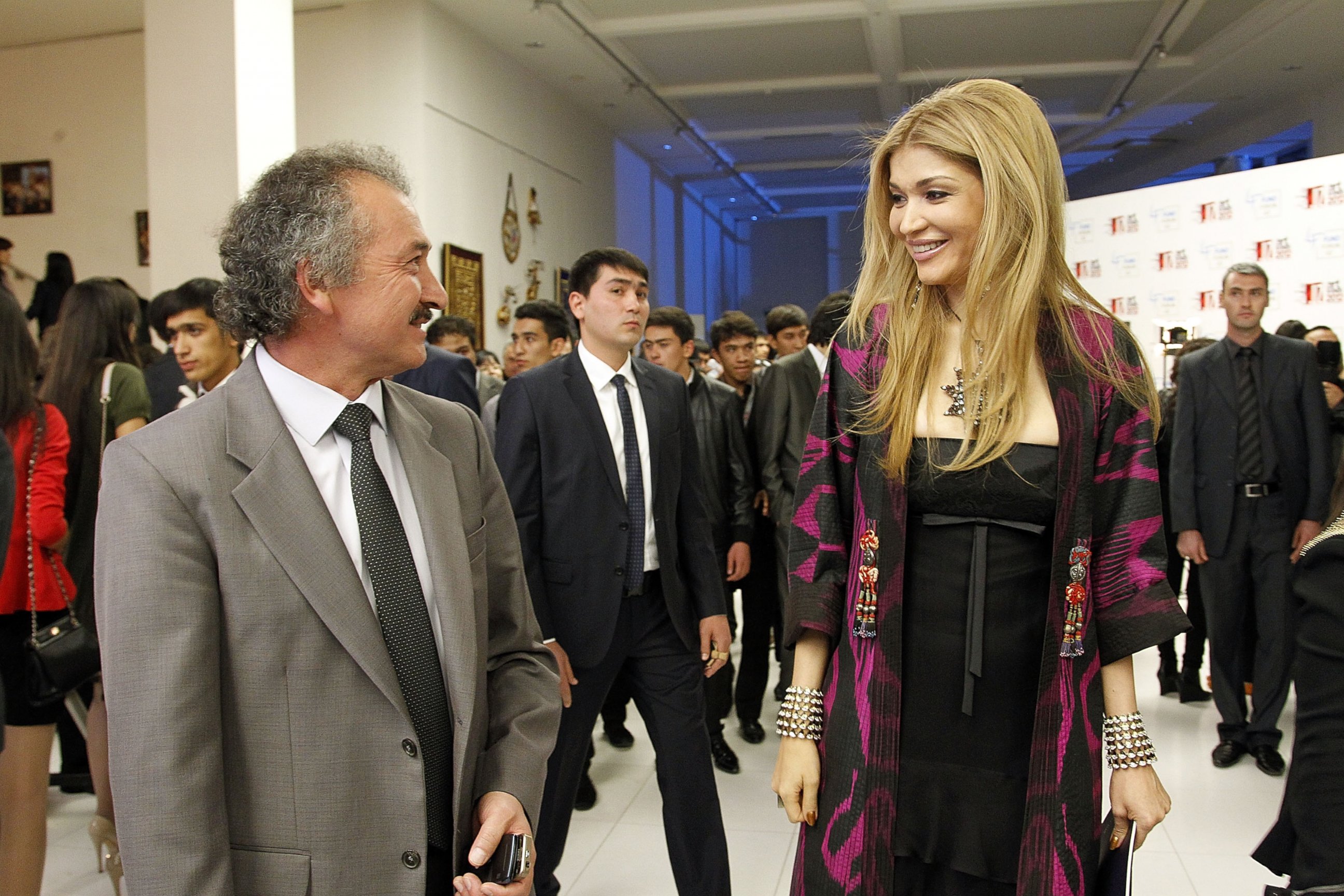 PHOTO: Painter Akmal Nur and Gulnara Karimova, Chairwoman of the Fund Forum Board of Trustees visit the exhibition during the Style.Uz Art Week 2012 opening ceremony on at The Youth Art Palace on Oct. 4, 2012 in Tashkent, Uzbekistan.  