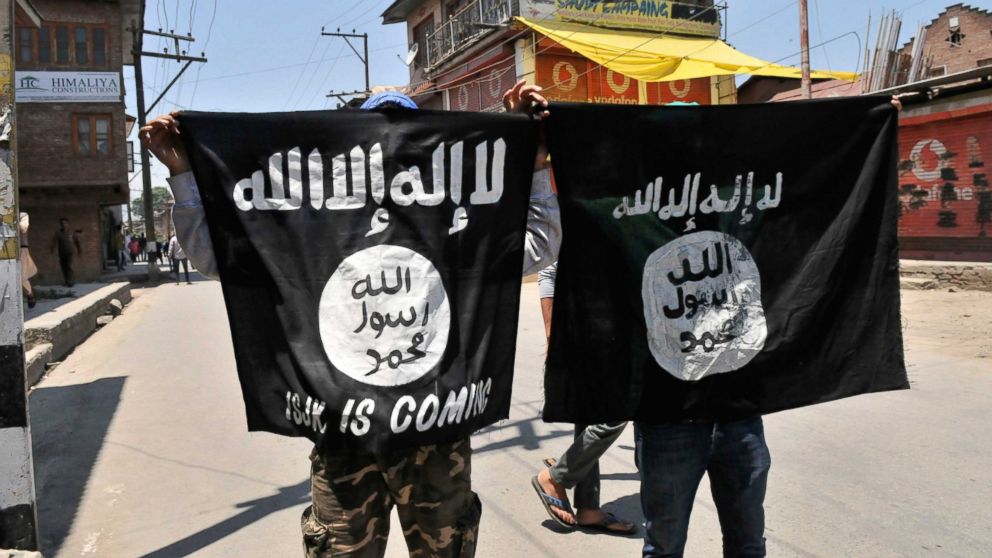 Kashmiri protesters displaying the flags of ISIS during a protest on June 27, 2015 in Srinagar, India.