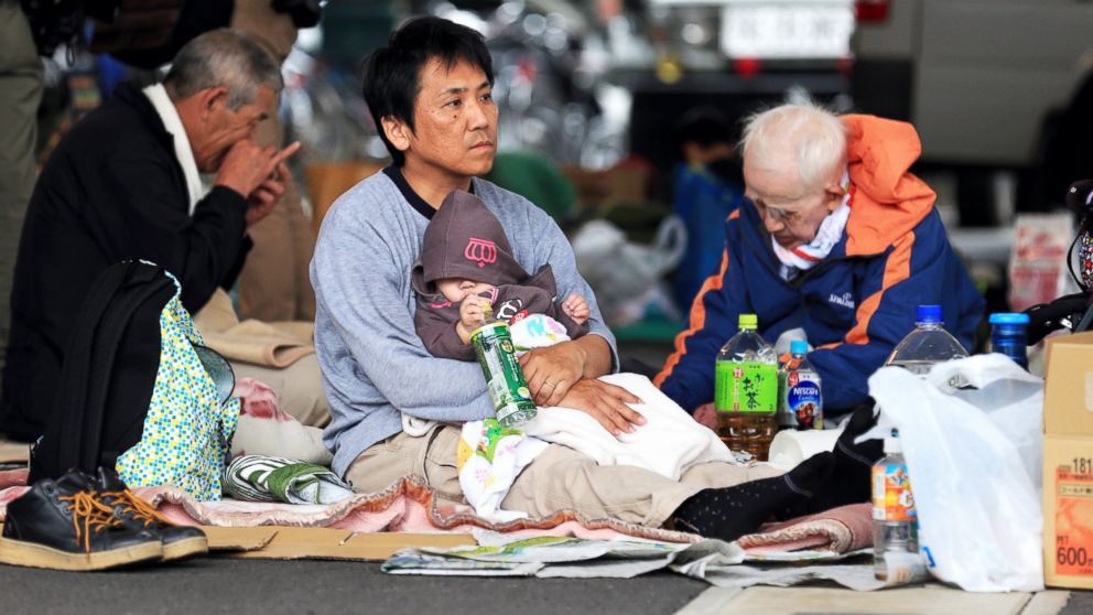 PHOTO: Evacuees spend time at an evacuation center on April 16, 2016 in Mashiki, Kumamoto, Japan.