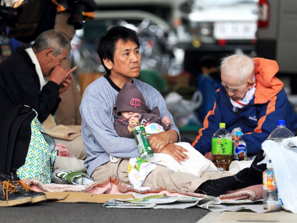 PHOTO: Evacuees spend time at an evacuation center on April 16, 2016 in Mashiki, Kumamoto, Japan.