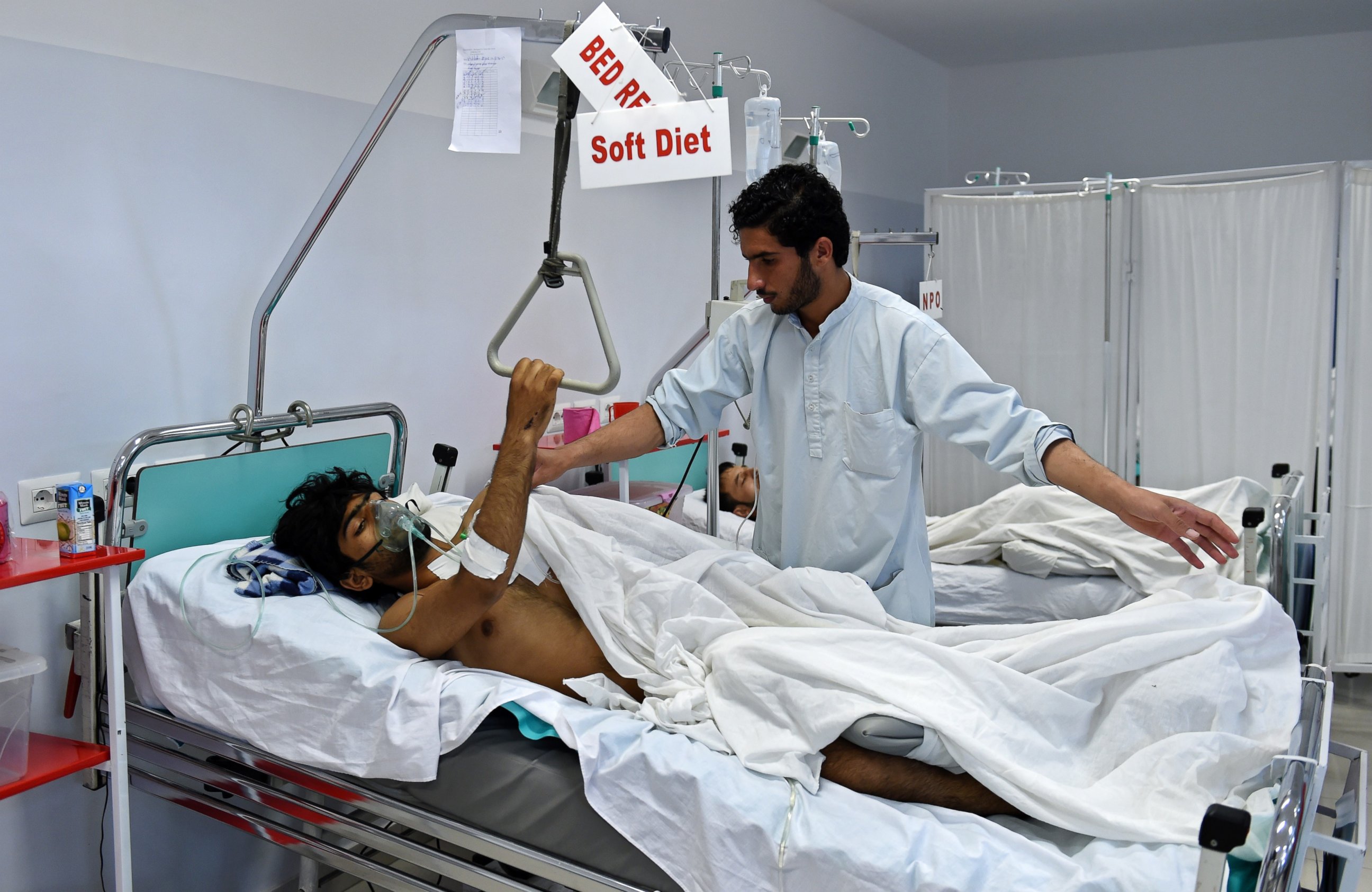 PHOTO: A wounded staff member of Doctors Without Borders who survived the bombing of the MSF Hospital in Kunduz receives treatment at an Italian aid organization's hospital in Kabul on Oct. 6, 2015. 