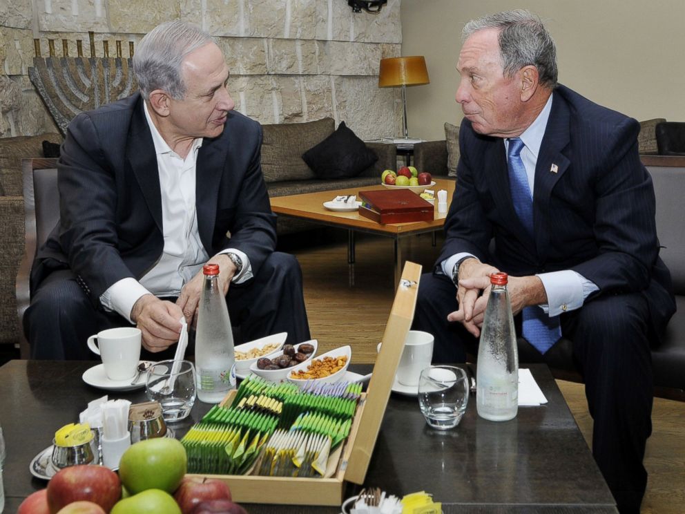 PHOTO: Israels prime minister, Benjamin Netanyahu, speaks with Michael Bloomberg at Ben Gurion International Airport near Tel Aviv, Israel on July 23, 2014.