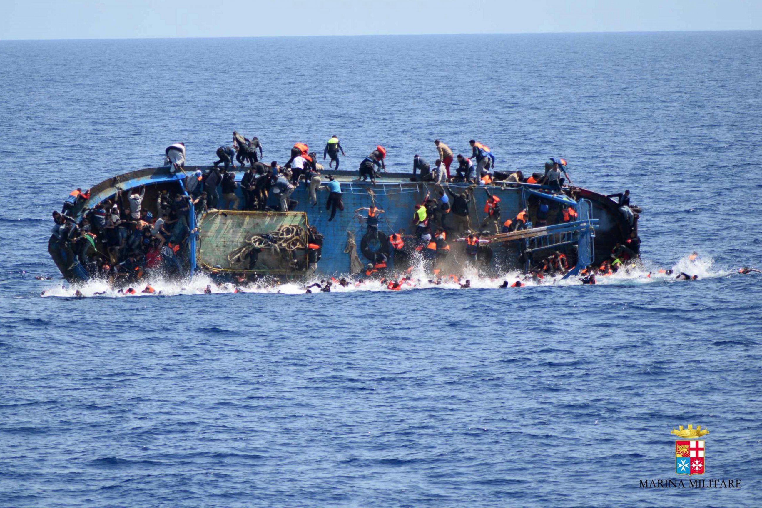 PHOTO: A handout picture from the Italian Navy shows the shipwreck of an overcrowded boat of migrants off the Libyan coast, May 25, 2016.