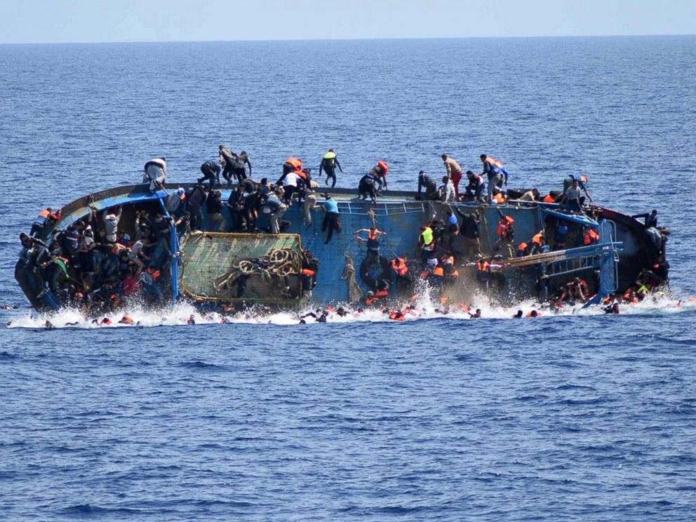 PHOTO: A handout picture from the Italian Navy shows the shipwreck of an overcrowded boat of migrants off the Libyan coast, May 25, 2016.