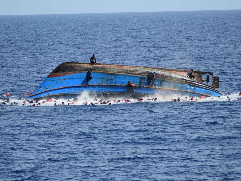 PHOTO: A handout picture from the Italian Navy shows the shipwreck of an overcrowded boat of migrants off the Libyan coast, May 25, 2016.