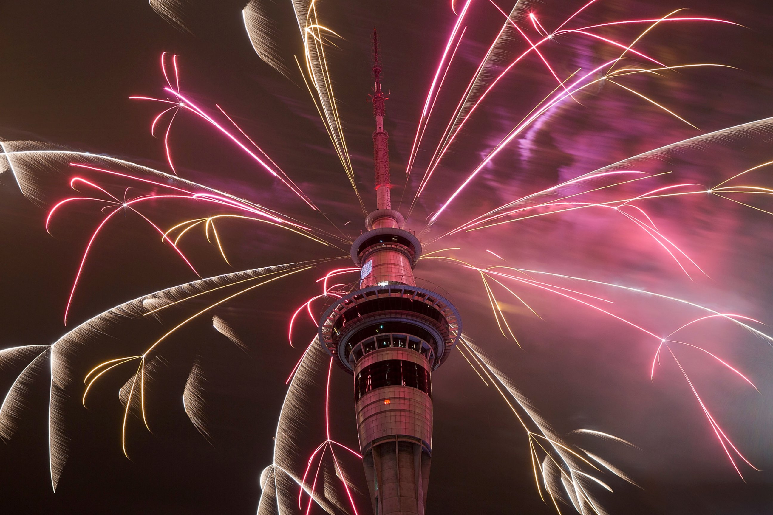 PHOTO: Firework display from the top of the Sky Tower to welcome the New Year on Jan. 1, 2015 in Auckland, New Zealand.