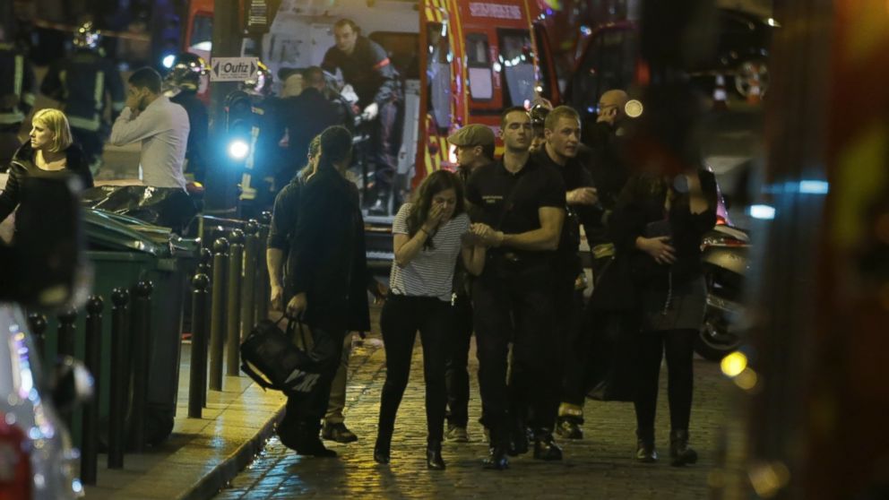 PHOTO: French security moves people in the area of Rue Bichat in the 10th arrondissement of the French capital Paris following a string of attacks on Nov. 13, 2015.