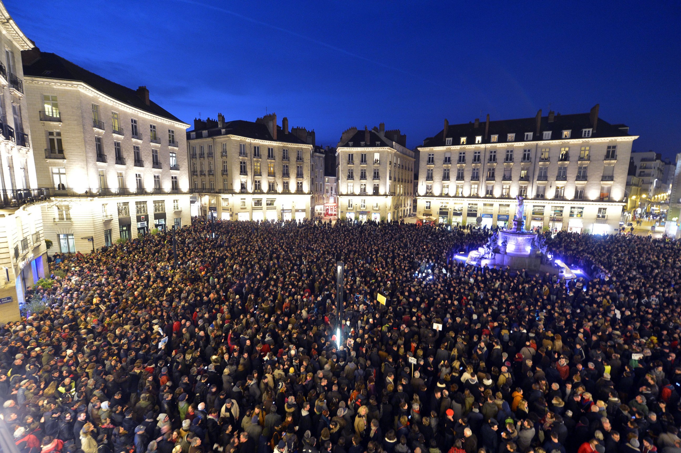 PHOTO: People gather at the Place Royale in Nantes to show their solidarity for the victims of the attack by unknown gunmen on the offices of the satirical weekly, Charlie Hebdo, in Paris, Jan. 7, 2015. 