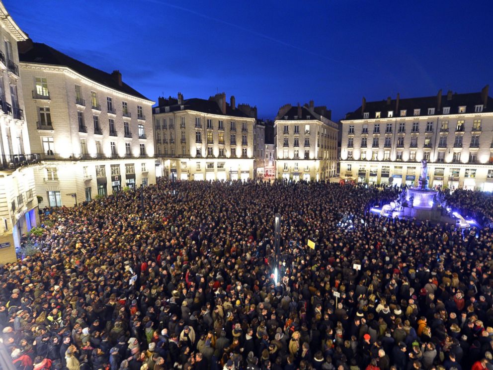 PHOTO: People gather at the Place Royale in Nantes to show their solidarity for the victims of the attack by unknown gunmen on the offices of the satirical weekly, Charlie Hebdo, in Paris, Jan. 7, 2015.