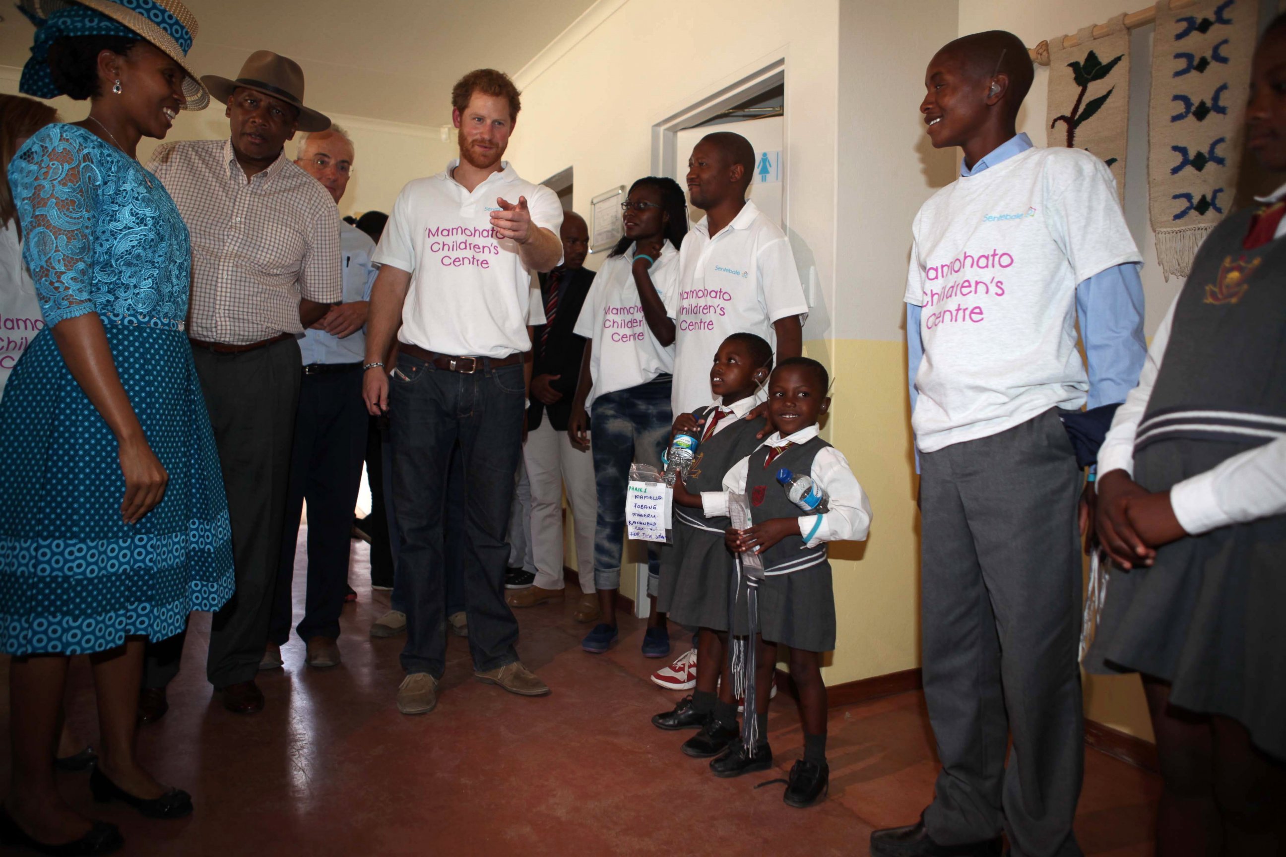 PHOTO: Children greet Prince Harry as he visits the Sentebale charity on Nov. 26, 2015 in Maeru, Lesotho, Sentebale.