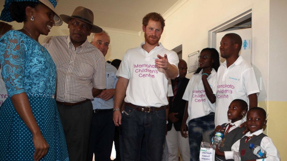 Children greet Prince Harry as he visits the Sentebale charity on Nov. 26, 2015 in Maeru, Lesotho, Sentebale.