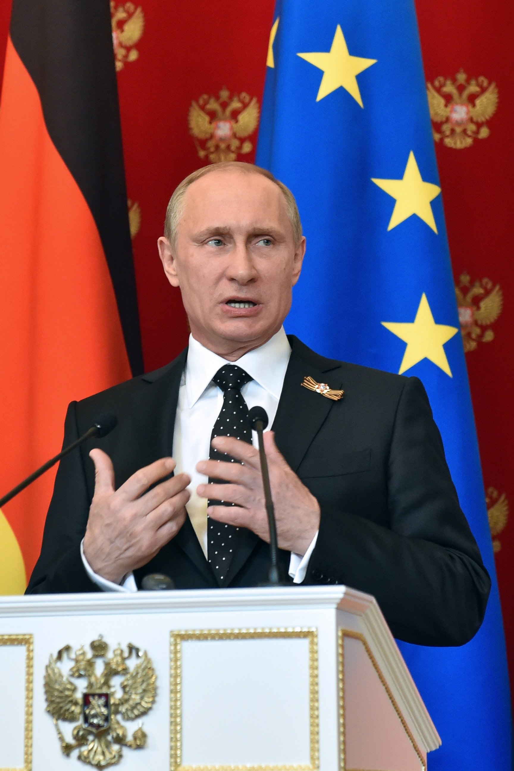 PHOTO: Russian President Vladimir Putin speaks during a joint press conference with German Chancellor at the Kremlin in Moscow on May 10, 2015. 