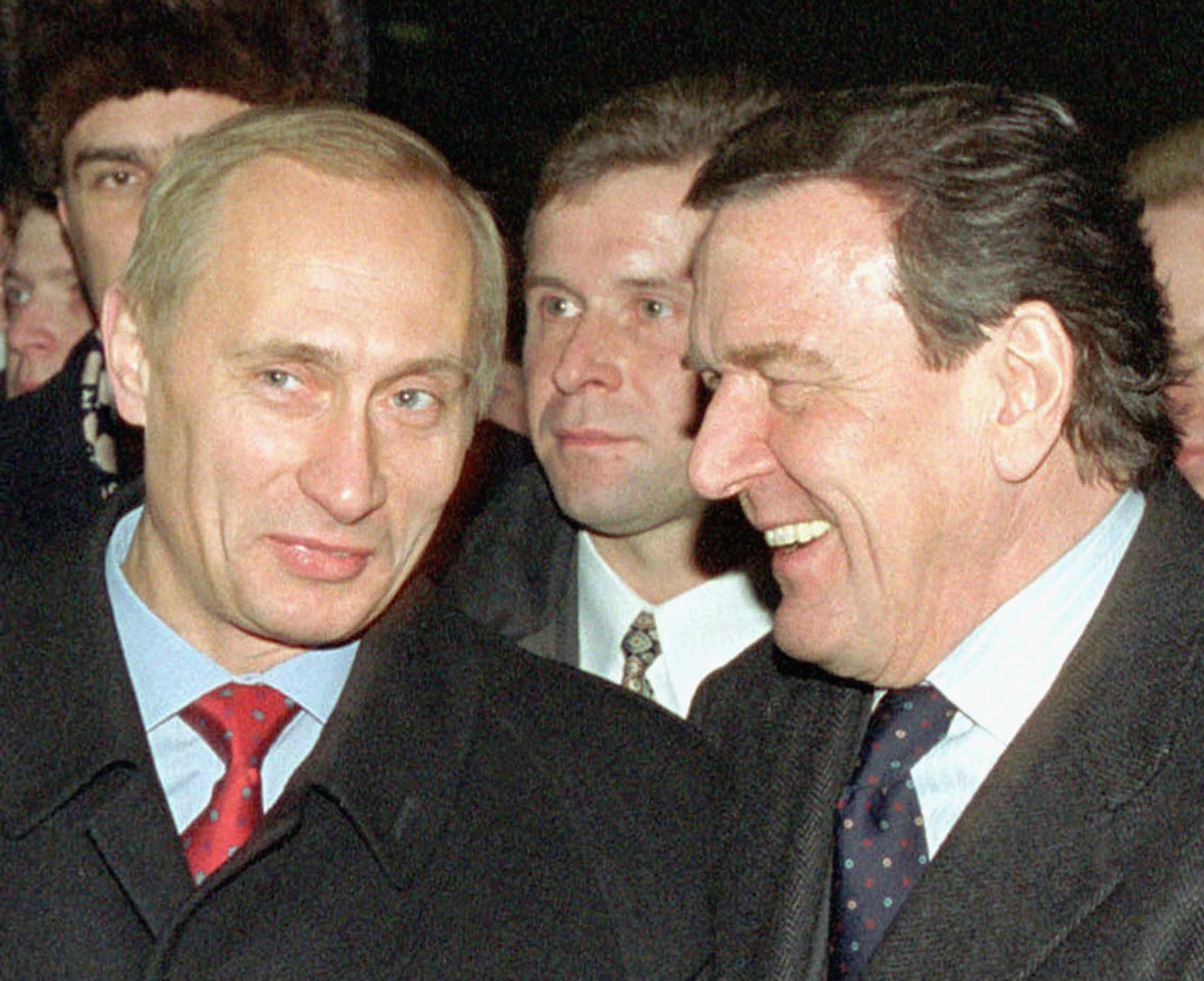 PHOTO: German Chancellor Gerhard Schroeder (R) and Russian President Vladimir Putin (L) walk in Red Square  Jan. 6, 2001. 