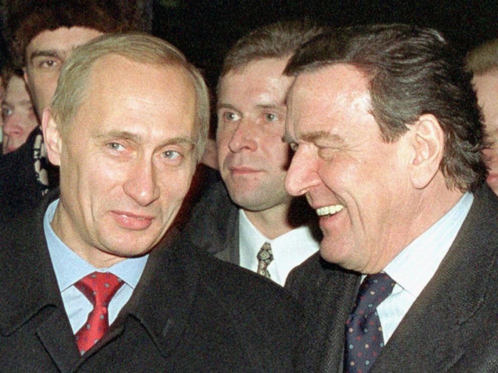 PHOTO: German Chancellor Gerhard Schroeder (R) and Russian President Vladimir Putin (L) walk in Red Square Jan. 6, 2001.